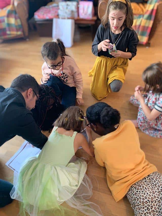 Kids playing detective game at home for a birthday party